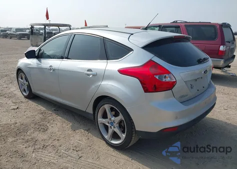 2013 Ford Focus Titanium z USA, uszkodzony, nr VIN 1FADP3N27DL220304